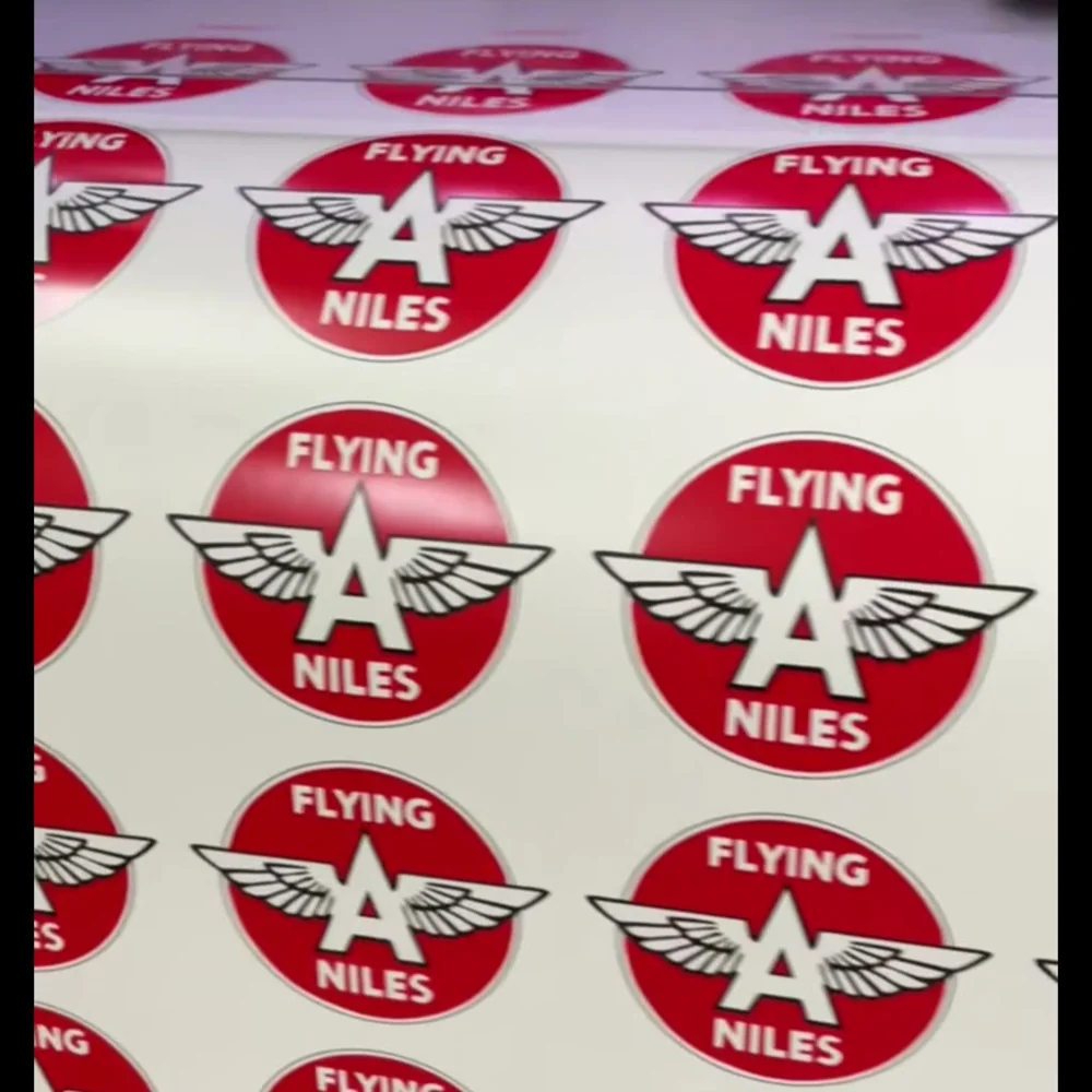 Stack of custom die-cut stickers printed by The Sticker Smith